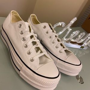 Women's white platform Chuck Taylor's size 9